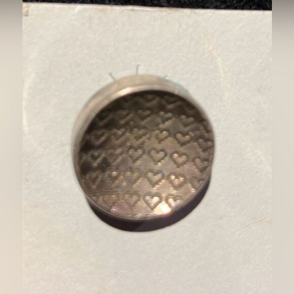 Never worn round silver earrings, approximately .75 inches tall - Picture 2 of 2